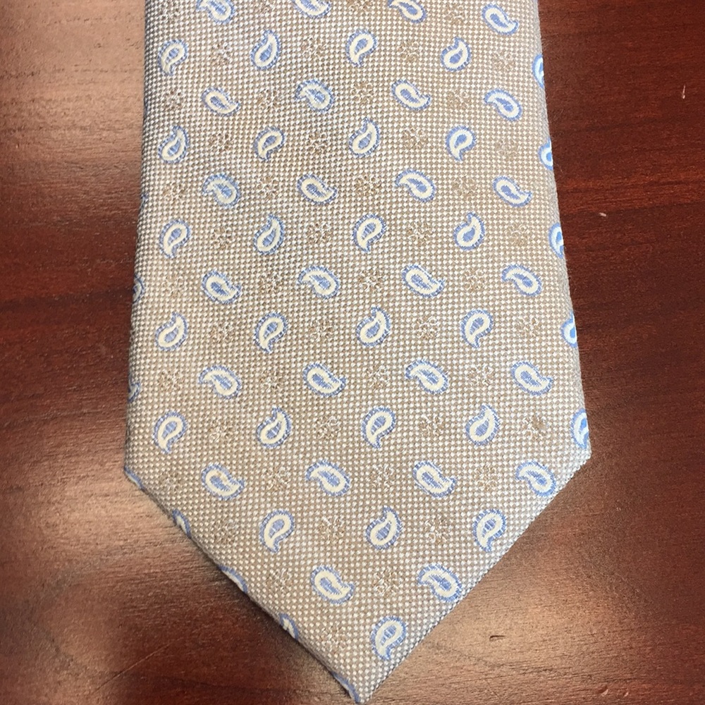 Bruno Pirttelli tan and blue tie.